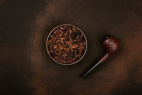 pipe tobacco and bowl of tobacco blend
