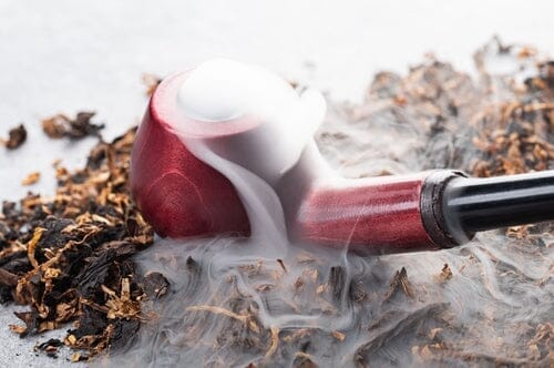 smoke coming out of a pipe