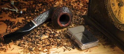 tobacco pipe and lighter