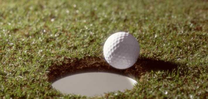 golf ball near hole